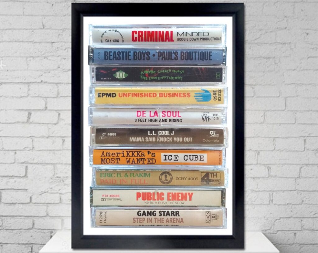 80s and 90s hip-hop cassette poster with albums by Public Enemy, Ice Cube, LL Cool J, De La Soul, and Beastie Boys.