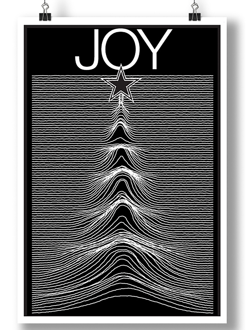 Man wearing a black JOY men’s t-shirt featuring a star and waveform graphic design, perfect for music and holiday style.