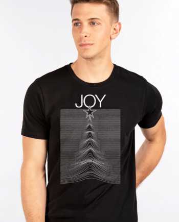 Man wearing a black JOY men’s t-shirt featuring a star and waveform graphic design, perfect for music and holiday style.